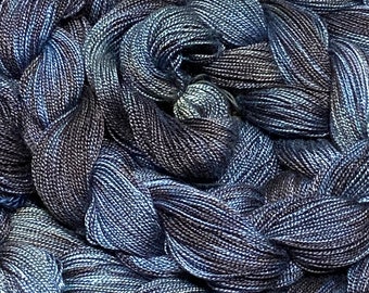 Hand-dyed, pre-wound weaving warps, 8/2 rayon, 5 7/8 yards, multiple ends, in shades of black, charcoal. steel blue, light blue, grey- DW293