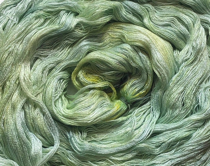 Hand-dyed, pre-wound weaving warp chain, 8/2 rayon, 3 1/8 yards, 400 ends, in shades of light bright green, light green, and yellow - DW254