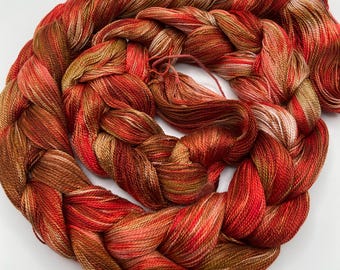Hand-dyed pre-wound weaving warp, 8/2 tencel/lyocell, 4 7/8 yards, in shades of red, brown, taupe, salmon, and white - DW328