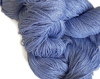 Hand-dyed 8/2 cotton and rayon yarn, 416 yard skein and 700 yard skein, in tonal shades of light medium blue