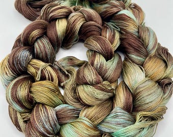 Hand-dyed pre-wound weaving warp, 8/2 Tencel/lyocell, 4 yards, in shades of dark brown, brown, golden brown, sage green, and bronze -DW319
