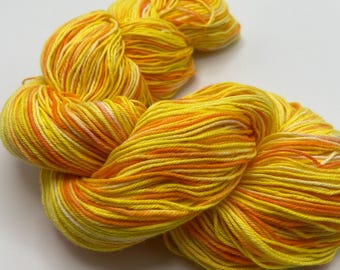 Hand-dyed yarn, 12/4 cotton, 306 yard skeins, in shades of yellow, orange, peach, and white - DY191