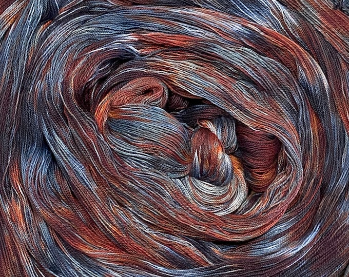 Hand-dyed pre-wound weaving warp, 14/2 cotton, 4 3/4 yards, in shades of black, dark blue, blue, light blue, brick, and burnt orange -DW299