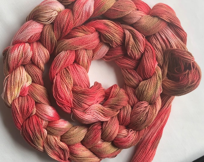 Hand-dyed, pre-wound weaving warp chain, 8/2 ring spun cotton, 5 3/4 yards, in shades of red, salmon, pink, brown, beige, and pink - DW268