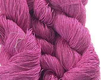 Hand-dyed 8/2 cotton and rayon yarn, 700 yard skeins and 231 yard skein, in tonal shades of rose
