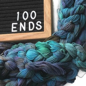 Hand-dyed, pre-wound weaving warp chain, 8/2 ring spun cotton, 3 3/4 yards, multiple ends, in shades turquoise, lavender, and brown DW265 100 ends