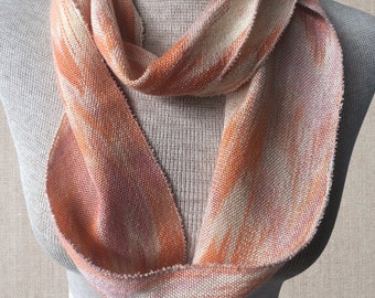 Hand-dyed, handwoven skinny infinity scarf, 4" x 60", tencel, in shades of pink, peach, orange, and cream