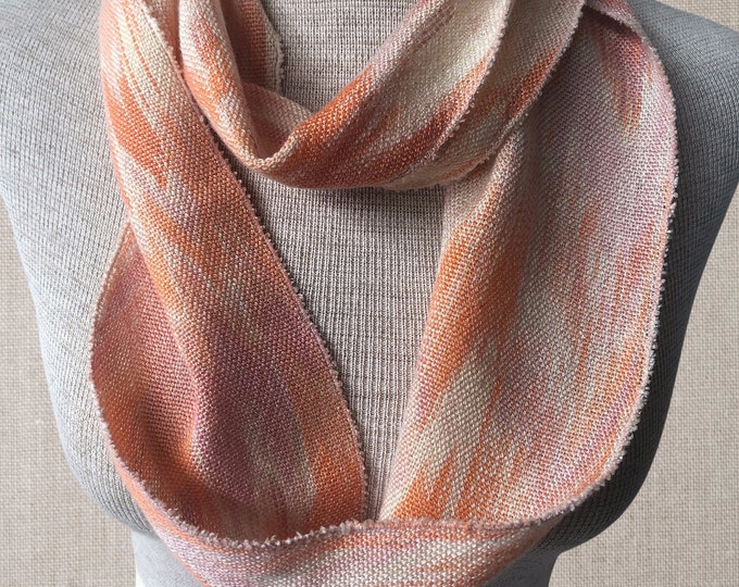 Hand-dyed, handwoven skinny infinity scarf, 4" x 60", tencel, in shades of pink, peach, orange, and cream