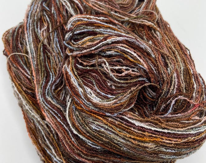 Hand-dyed rayon and cotton boucle, 437 yard skeins, in shades of dark brown, brown, grey, burnt orange, sage, salmon, and white -DY196