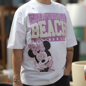 Camiseta unissex oversized, patchwork vintage reciclado, moda ecológica, arte vestível com patches.