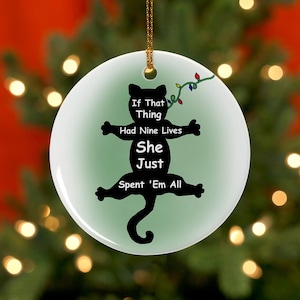 If That Thing Had Nine Lives She Just Spent &#39;Em All Ceramic Christmas Ornament, 2024 -  Ready to ship