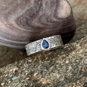 Silver and natural blue sapphire ring