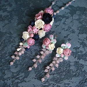 Gorgeous floral set of polymer clay and rose quartz beads.