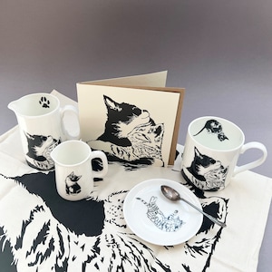 An image of our cuddling kittens collection which incudes the card, mug, 1/4 Pint jug, 1/2 pint jug, tea towel and round trinket dish