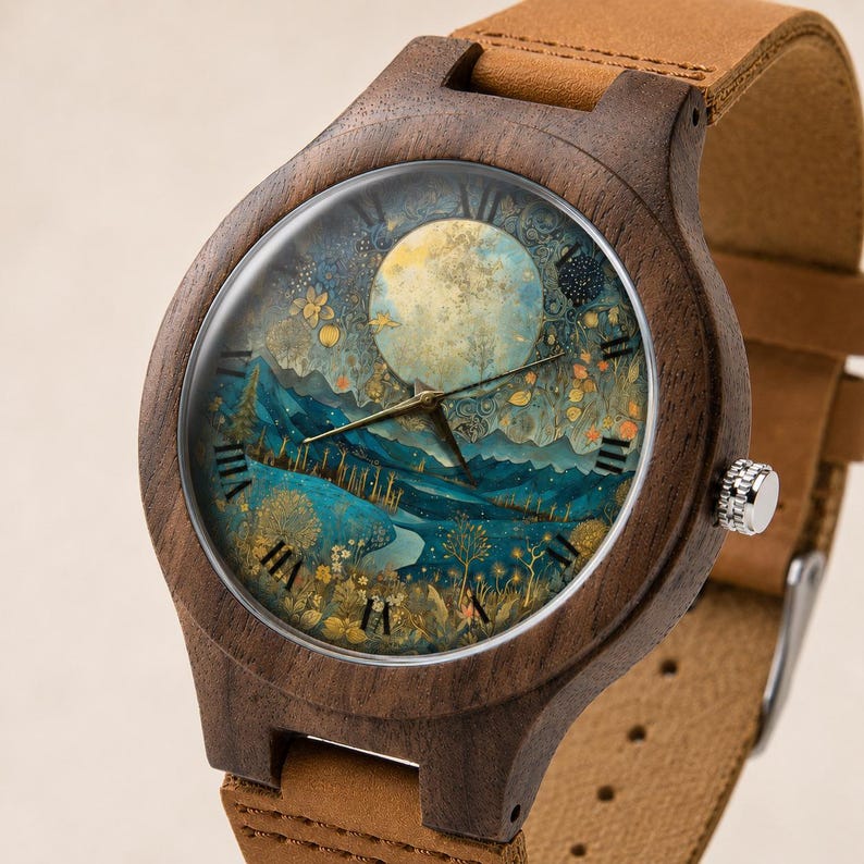 May include: A wristwatch with a dark brown wooden case and a tan leather strap. The watch face features a circular illustration of a full moon over a blue landscape with trees and golden floral accents, marked by black Roman numeral hour indicators.