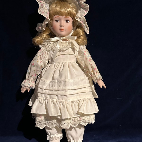 Muñeca de porcelana vintage de coleccionista