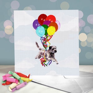 Pup Pup and Away - a border terrier being carried away by balloons