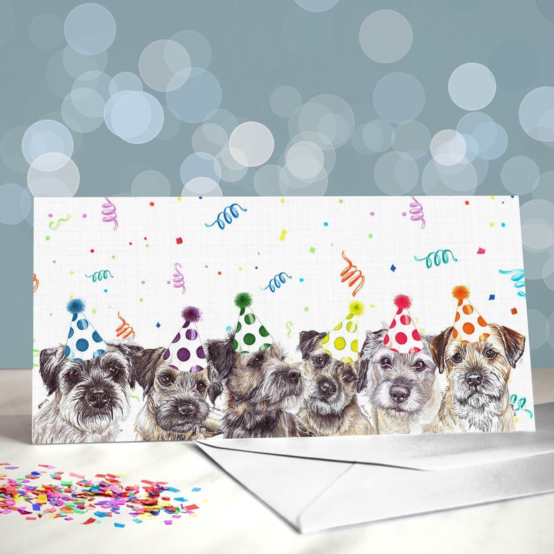 Party Animals - a group of six border terriers wearing party hats
