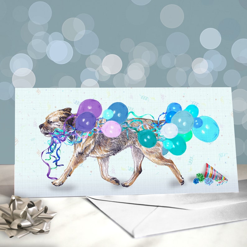 Party Planner - A border terrier carrying a bouquet of balloons