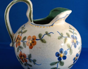 Pitcher, 6 3/4 high, 6 inch diameter; "Astrid" pattern; Gouda Holland pottery; 1935 to 1945