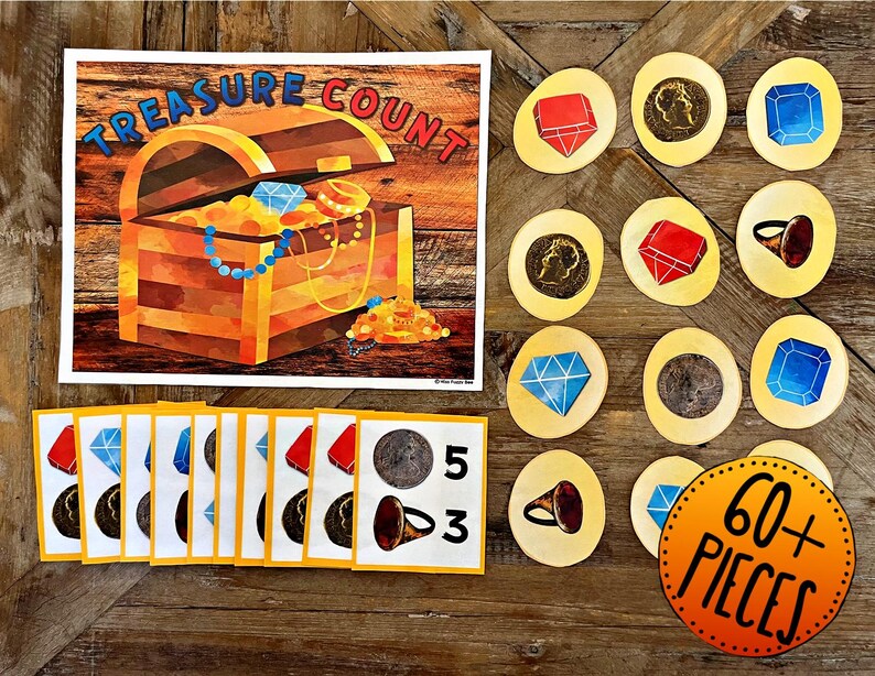 May include: A colorful wooden treasure chest with gold coins and jewels inside. The chest is open and there are several counting cards with different numbers and images of coins, jewels, and a horn. The text "Treasure Count" is written on the top of the image. There is a sign that says "60+ Pieces".