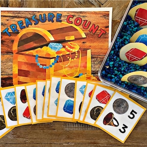 May include: A colorful educational game for kids featuring a treasure chest with gems and coins. The game includes cards with pictures of gems, coins, and numbers. The game is called "Treasure Count".