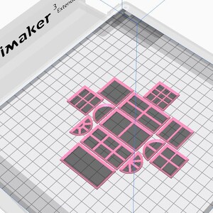 May include: A 3D-printed design featuring various window shapes in pink and grey, arranged on a grid. The word "Ultimaker" is visible in the upper left corner. The design includes rectangular, square, and arched window shapes.