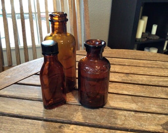 Lot Of 3 Vintage Amber Glass Bottles