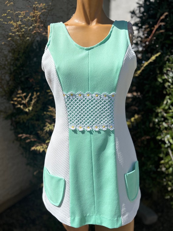 Vintage 1970s 2 Piece White Polyester Tennis Dress w Matching Pantie With Pastel Green Insert Center Front and Daisy Netting Bust 34" Vintage 1970s 2 Piece White Polyester Tennis Dress w Matching Pantie With Pastel Green Insert Center Front and Daisy Netting Bust 34"