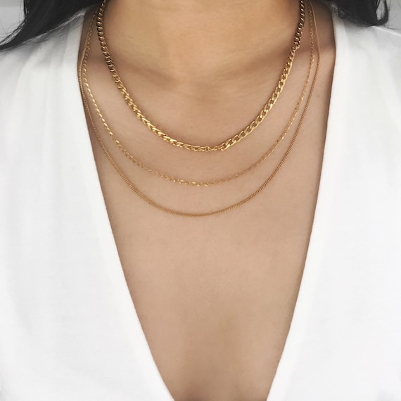Gold necklaces to layer deals