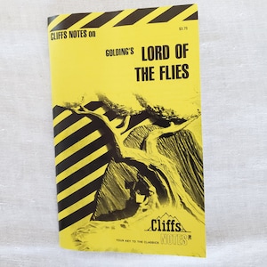 May include: A yellow and black Cliffs Notes booklet titled "Golding's Lord of the Flies." The cover features a mountain illustration and diagonal black stripes. The text "Cliffs Notes" and "Your Key to the Classics" are also visible.