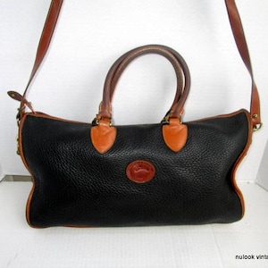 sz X L DOONEY and BOURKE vintage black and brown leather  purse