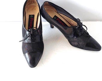 sz 7 M women vintage black leather and mesh shoes, lace up oxford high heel shoes PROXY label
