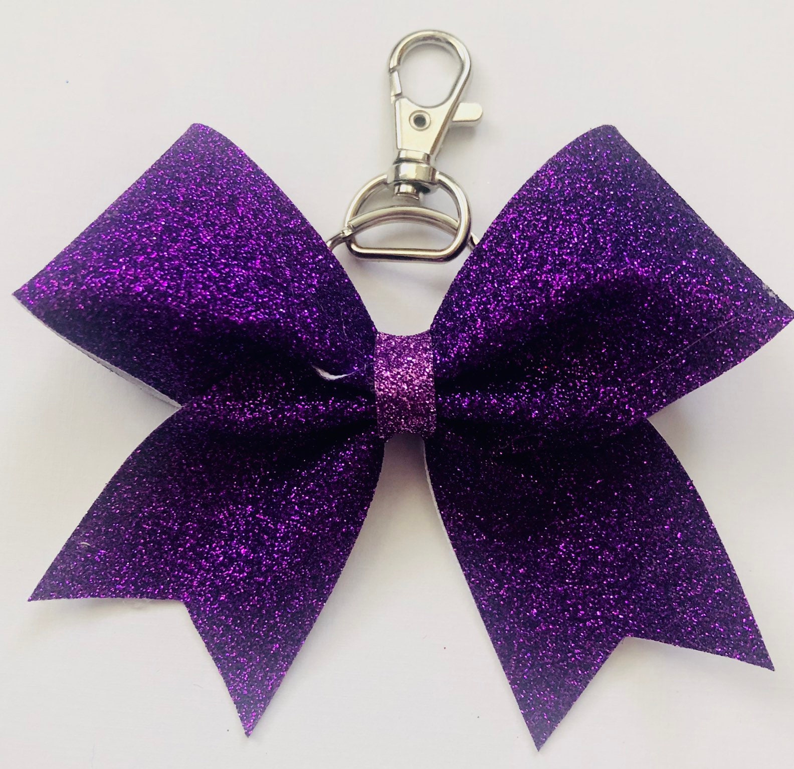 The ONE - Exclusive Event Glitter Key Chain Cheer Bow 2023 (10 Keychai