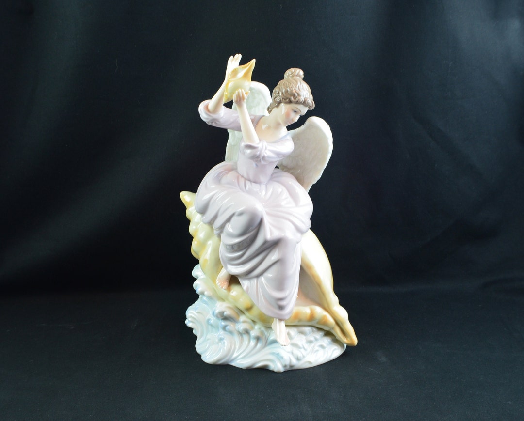 One Winged Angel Figure Grandeur Noel Porcelain Winged Angel Figurine in a Lavender Gown ...