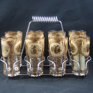 Cera (labeled) 22K Gold &quot;Pineapple with Fruit&quot; Set of 8 Highball Glasses with Chrome Plated Carrier (1980s).