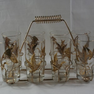 Culver 22K Gold &quot;Flying Geese&quot; 8 Highball/Tumbler Set with Polished Brass Carrier (1960s).
