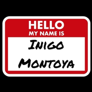 May include: A red and white name tag with the text "HELLO MY NAME IS INIGO MONTOYA".
