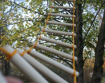 Long rope ladder for hard to reach places and playgrounds
