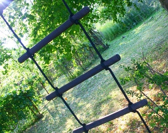Rope ladder for hard to access places and playgrounds