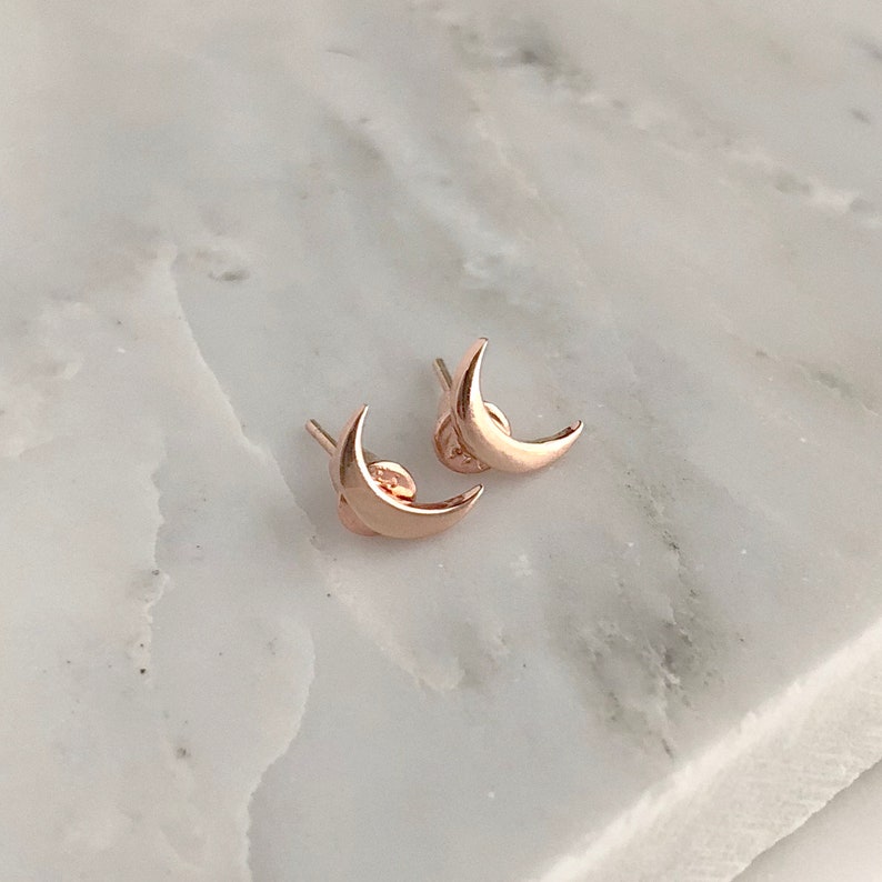 Crescent moon earrings in rose gold