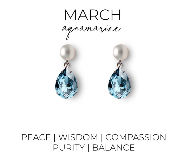 Aquamarine crystal earrings with a pearl post on an earring card that says "March, aquamarine" at the top and "Peace, Wisdom, Compassion, Purity, and Balance" at the bottom