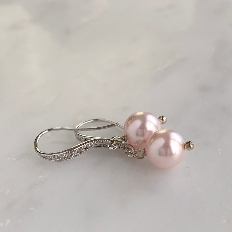 Blush pink pearl drop earrings with silver ear wires