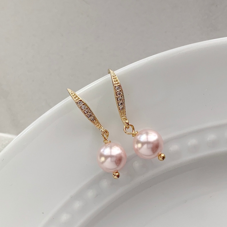 Blush pink pearl drop earrings with gold ear wires