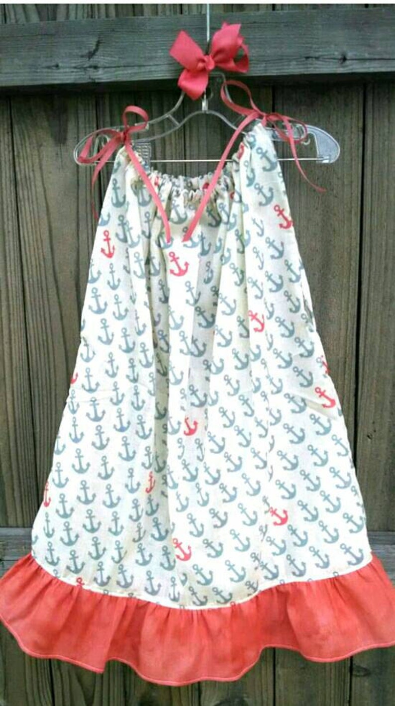coral and tan dress