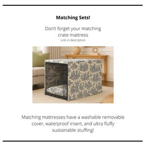 May include: A dog crate with a matching cover and mattress. The cover and mattress feature a blue and white toile pattern. The text "Matching Sets!" and "Don't forget your matching crate mattress" are visible.