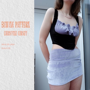 May include: A sewing pattern for a black and purple velvet corset. The pattern is available in sizes 6-24 and is printed on A4 or US Letter paper. The image shows a person wearing the finished corset.