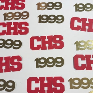 May include: A collection of gold and red paper cutouts with the text "CHS" and "1999".