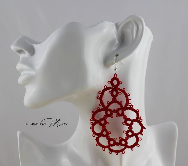 Red earrings in cotton and beads