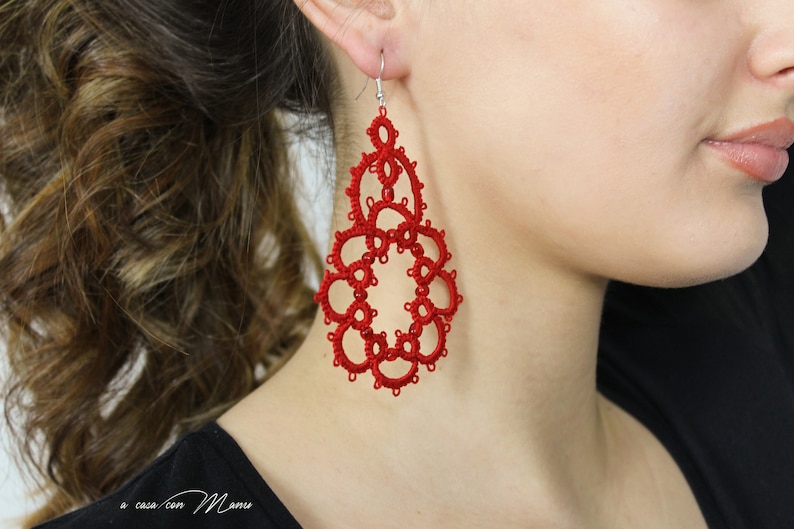 Red earrings in cotton and beads